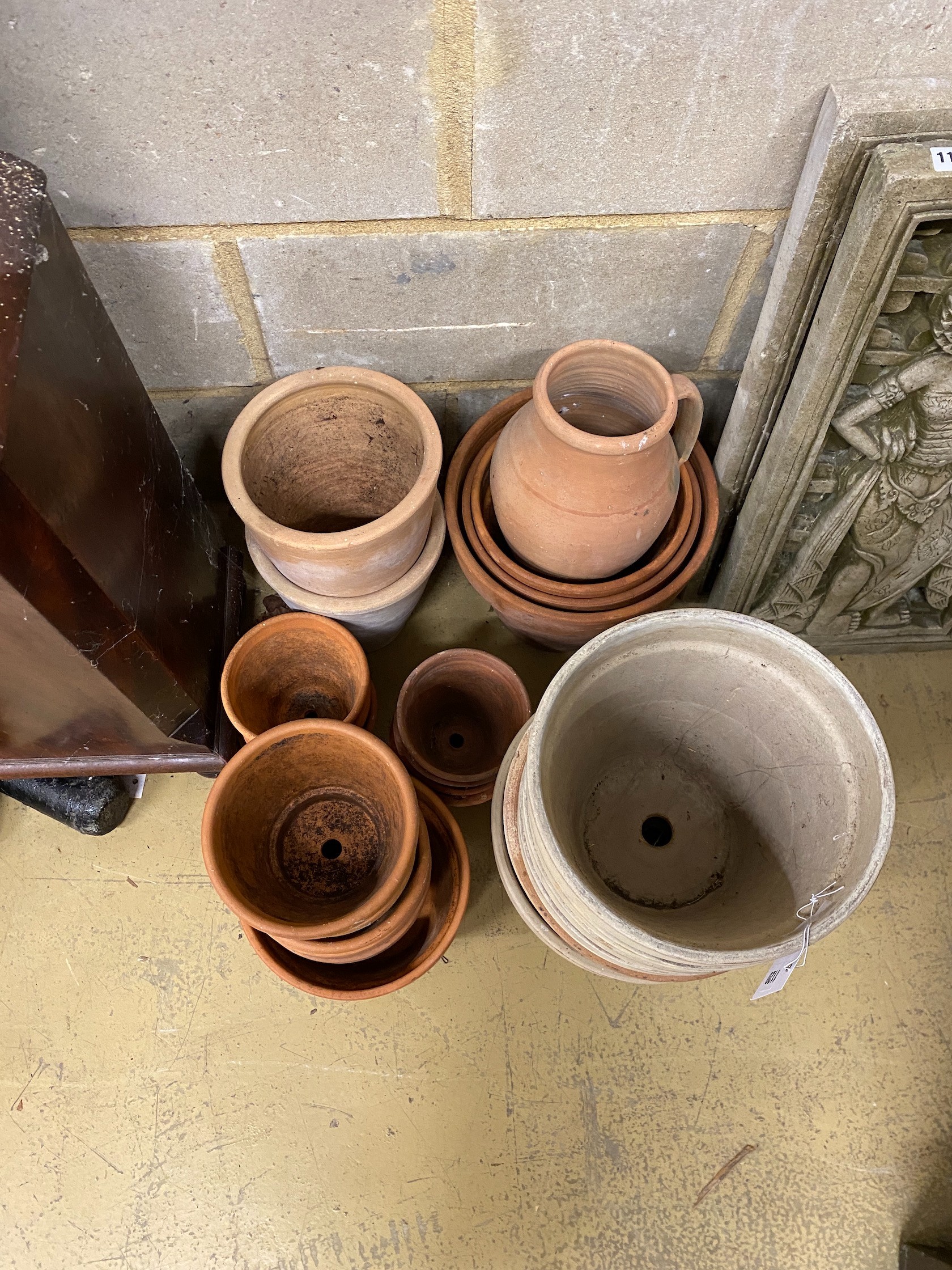 Approximately 26 assorted terracotta pots, largest height 24cm